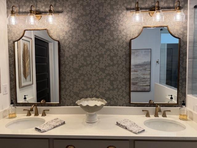 63 Aspen Way, Dallas, GA 30157 - bathroom with wallpapered walls and double vanity