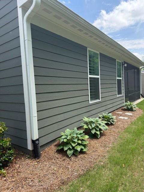 63 Aspen Way, Dallas, GA 30157 - view of property exterior with a sunroom