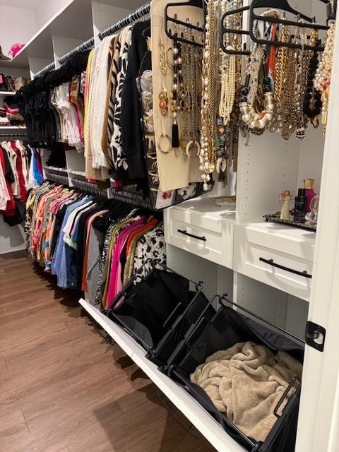 63 Aspen Way, Dallas, GA 30157 - walk in closet with wood finished floors