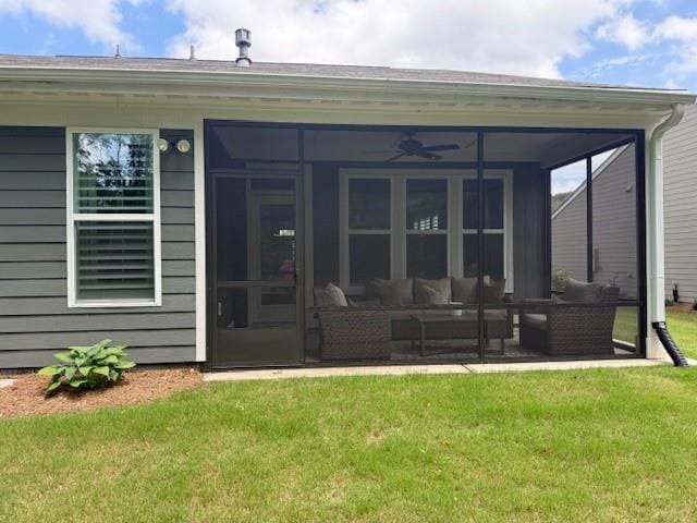 63 Aspen Way, Dallas, GA 30157 - rear view of house with a sunroom, a lawn, and an outdoor living space