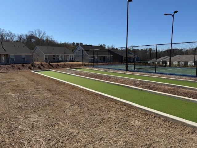 63 Aspen Way, Dallas, GA 30157 - view of community with a game area, a tennis court, and a residential view