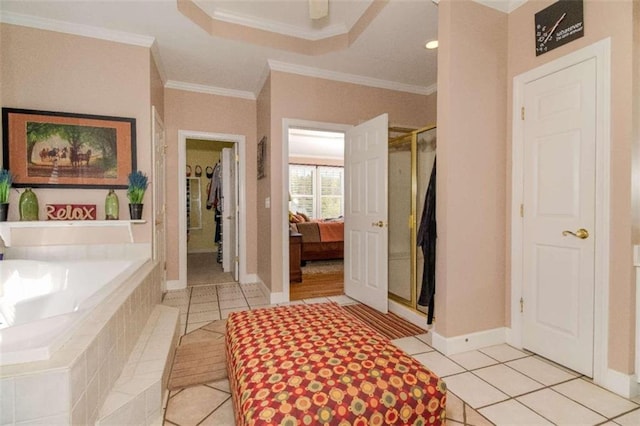 bathroom featuring ornamental molding, independent shower and bath, and tile patterned flooring