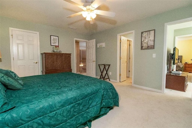 bedroom with ceiling fan and carpet floors