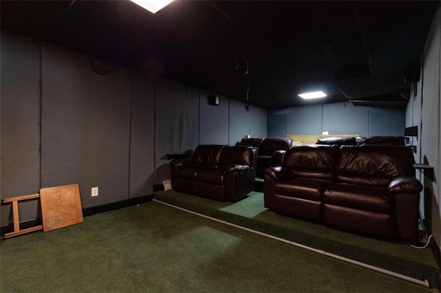 home theater with dark carpet