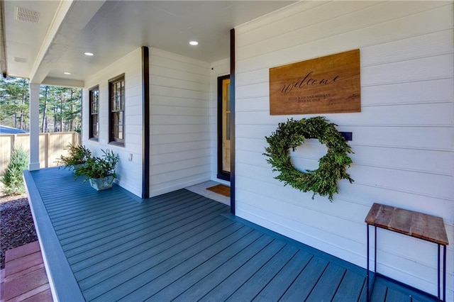 wooden terrace with covered porch