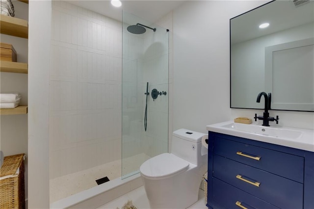 bathroom featuring toilet, recessed lighting, walk in shower, and vanity