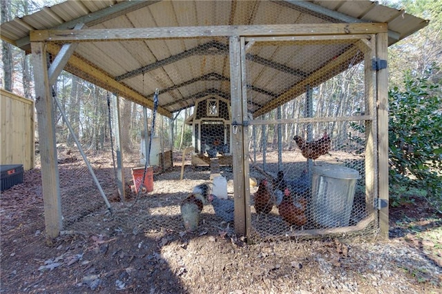 exterior space with a detached carport and central AC