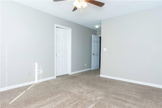 2384 Coach Way, Jonesboro, GA 30236 - carpeted spare room featuring a ceiling fan and baseboards
