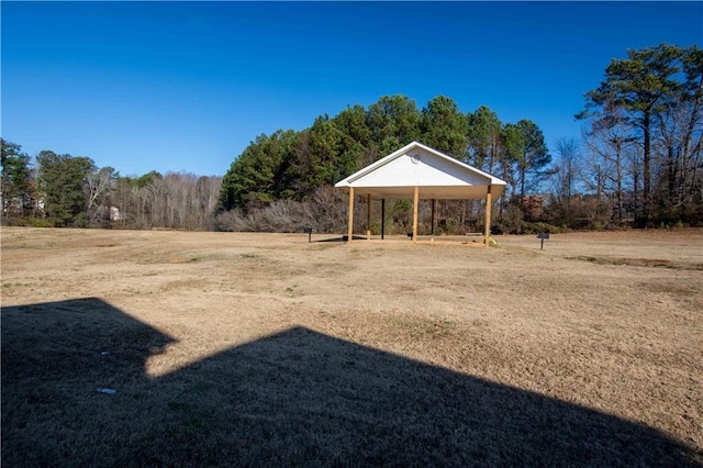 2384 Coach Way, Jonesboro, GA 30236 - view of yard with a detached carport