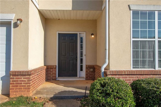 2384 Coach Way, Jonesboro, GA 30236 - view of exterior entry with stucco siding and brick siding