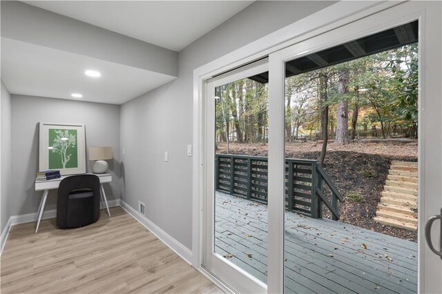 doorway featuring light hardwood / wood-style flooring