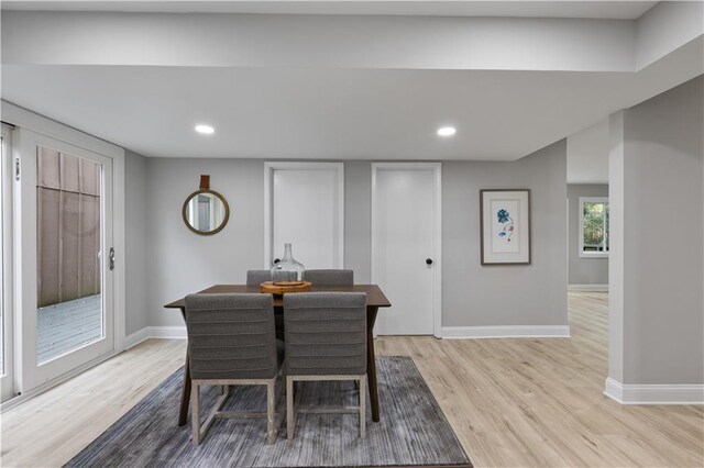 dining area with light wood-type flooring