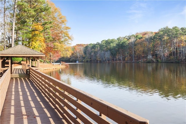 dock area featuring a gazebo and a water view