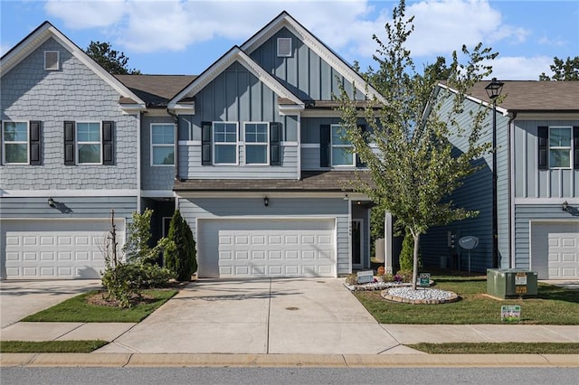 7086 Gladstone Cir, Lithonia, GA 30038 - craftsman-style house with board and batten siding, driveway, and a garage