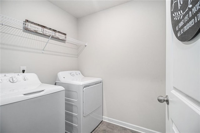 7086 Gladstone Cir, Lithonia, GA 30038 - washroom with washer and dryer and baseboards