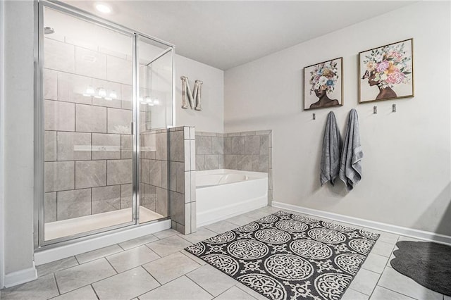 7086 Gladstone Cir, Lithonia, GA 30038 - full bath with tile patterned floors, a bath, and a stall shower