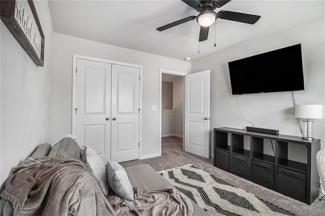 7086 Gladstone Cir, Lithonia, GA 30038 - bedroom with carpet, a closet, and a ceiling fan