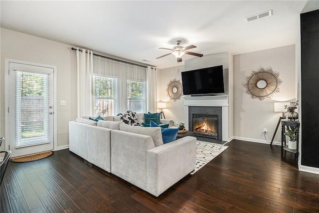7086 Gladstone Cir, Lithonia, GA 30038 - living room with a ceiling fan, a fireplace with flush hearth, hardwood / wood-style floors, and plenty of natural light