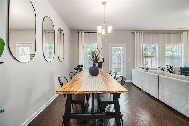 7086 Gladstone Cir, Lithonia, GA 30038 - dining space featuring dark wood-style floors and a chandelier