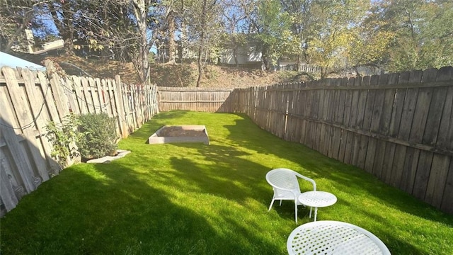 view of yard with a fenced backyard