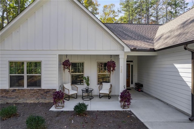 doorway to property with covered porch