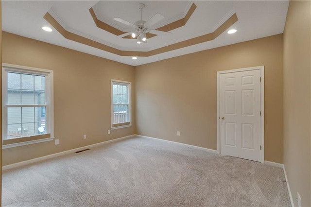 1008 Walnut Creek Dr, Woodstock, GA 30188 - spare room featuring crown molding, carpet flooring, ceiling fan, baseboards, and visible vents