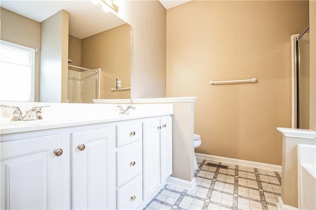 1008 Walnut Creek Dr, Woodstock, GA 30188 - full bath featuring a sink, baseboards, toilet, a shower with door, and a tub to relax in