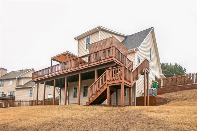 1008 Walnut Creek Dr, Woodstock, GA 30188 - rear view of property with stairs, a lawn, fence, and a deck