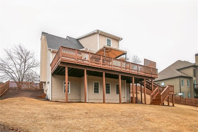 1008 Walnut Creek Dr, Woodstock, GA 30188 - rear view of property featuring a fenced backyard, stairway, a yard, and a deck