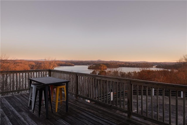 deck at dusk with a water view