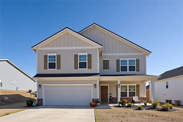 1628 Newport Dr, Bethlehem, GA 30620 - craftsman inspired home featuring a porch, concrete driveway, a garage, board and batten siding, and stone siding