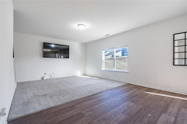 1628 Newport Dr, Bethlehem, GA 30620 - unfurnished living room with wood finished floors and baseboards