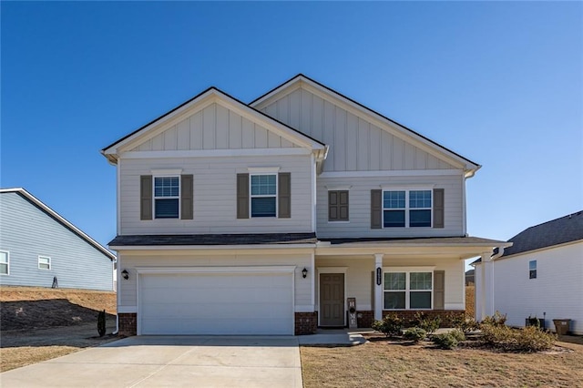 1628 Newport Dr, Bethlehem, GA 30620 - craftsman-style home featuring an attached garage, brick siding, board and batten siding, driveway, and a porch