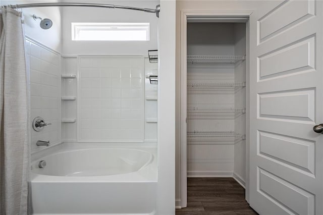 1628 Newport Dr, Bethlehem, GA 30620 - bathroom featuring shower / tub combo and wood finished floors