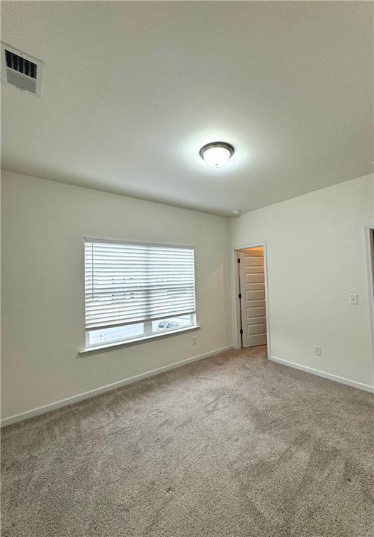 1628 Newport Dr, Bethlehem, GA 30620 - spare room with carpet and baseboards