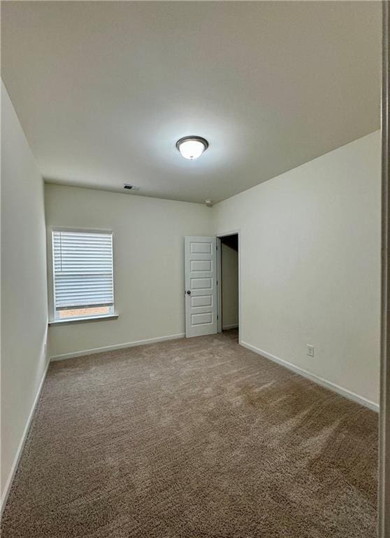 1628 Newport Dr, Bethlehem, GA 30620 - carpeted empty room featuring baseboards