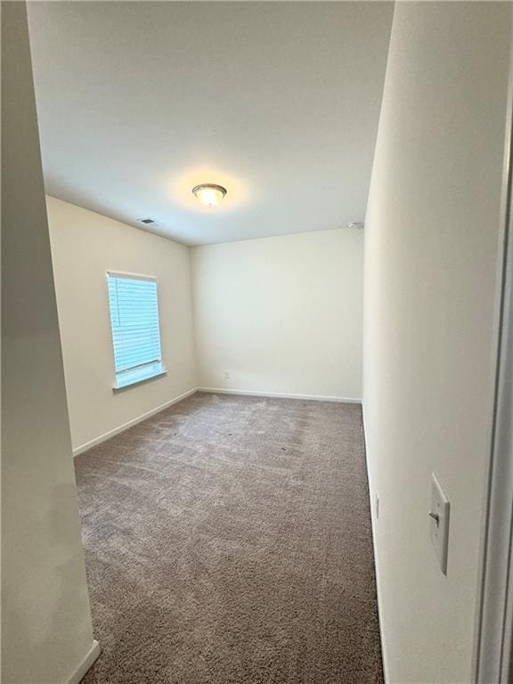 1628 Newport Dr, Bethlehem, GA 30620 - spare room featuring carpet floors and baseboards