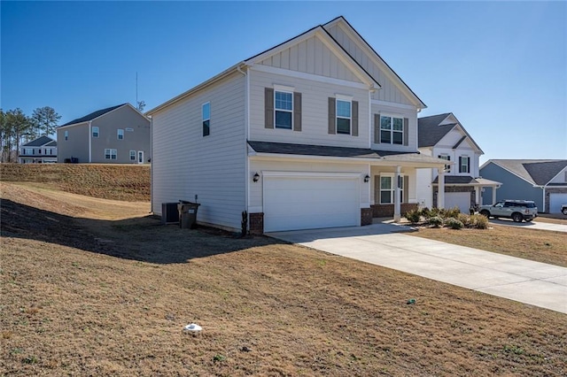 1628 Newport Dr, Bethlehem, GA 30620 - craftsman inspired home featuring board and batten siding, a garage, driveway, cooling unit, and a front lawn