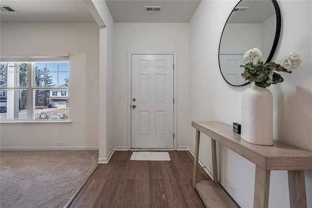 1628 Newport Dr, Bethlehem, GA 30620 - foyer featuring dark wood finished floors and baseboards