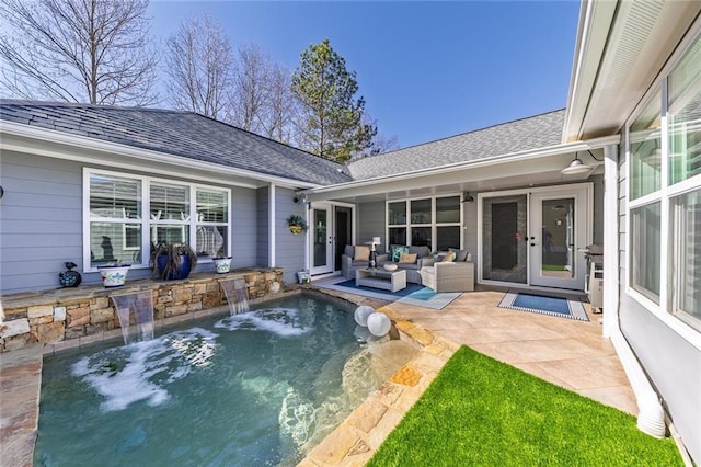 view of swimming pool with french doors, a patio, and an outdoor hangout area