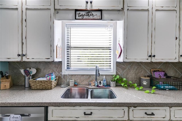 1189 Norfolk Dr NW, Acworth, GA 30102 - kitchen featuring decorative backsplash, dishwasher, white cabinets, and a sink