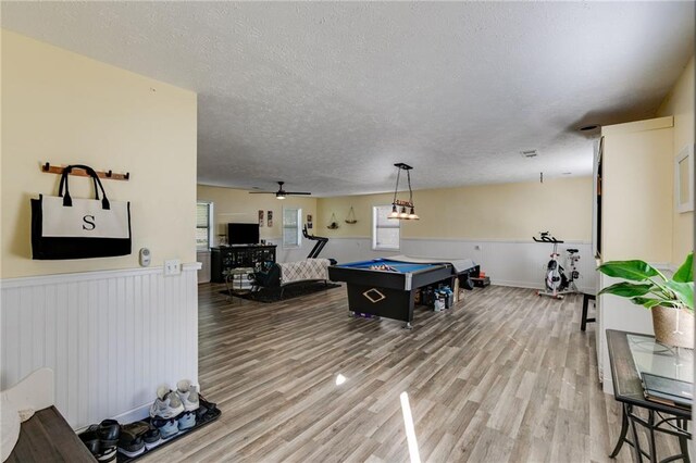 1189 Norfolk Dr NW, Acworth, GA 30102 - game room with ceiling fan, light wood-type flooring, pool table, a textured ceiling, and wainscoting