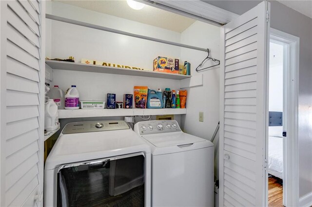 1189 Norfolk Dr NW, Acworth, GA 30102 - washroom with wood finished floors, separate washer and dryer, and laundry area