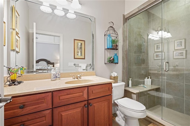 2630 Weddington Pl NE, Marietta, GA 30068 - ensuite bathroom with toilet, vanity, and a stall shower
