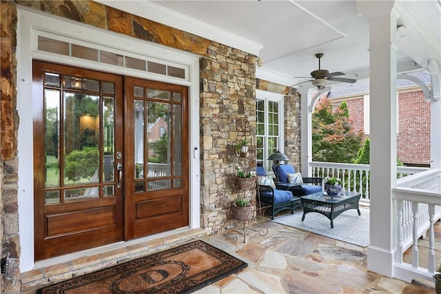 2630 Weddington Pl NE, Marietta, GA 30068 - property entrance featuring french doors, stone siding, ceiling fan, and a porch