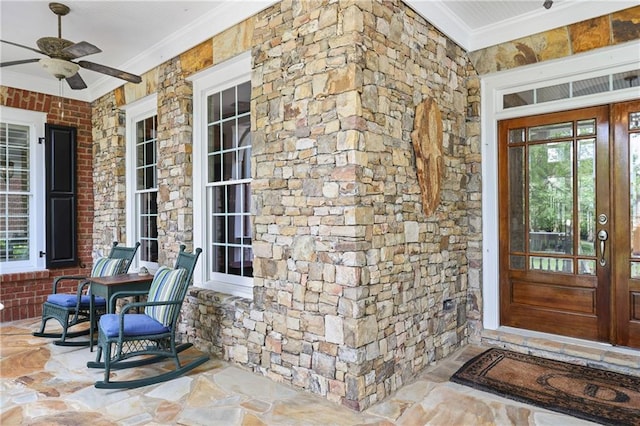 2630 Weddington Pl NE, Marietta, GA 30068 - entrance to property with a ceiling fan, covered porch, and stone siding