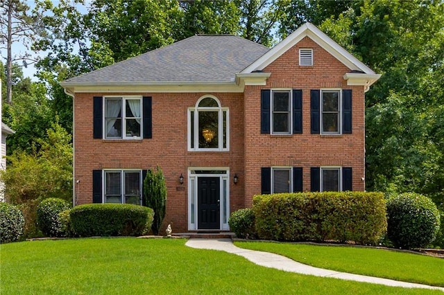 1019 Legacy Walk, Woodstock, GA 30189 - view of front of property with a front lawn and brick siding
