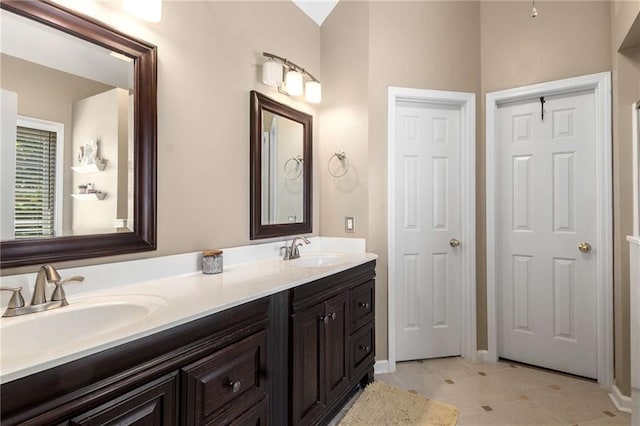 1019 Legacy Walk, Woodstock, GA 30189 - full bath featuring double vanity, tile patterned flooring, and baseboards
