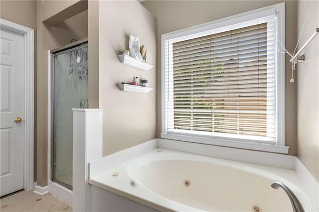 1019 Legacy Walk, Woodstock, GA 30189 - bathroom with a shower stall, a tub with jets, and plenty of natural light