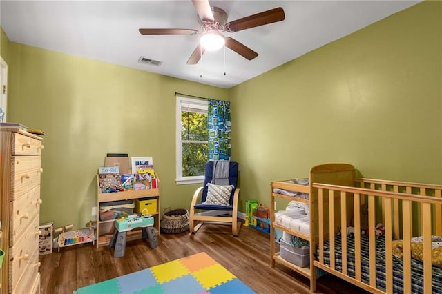 1019 Legacy Walk, Woodstock, GA 30189 - bedroom with wood finished floors, ceiling fan, and baseboards